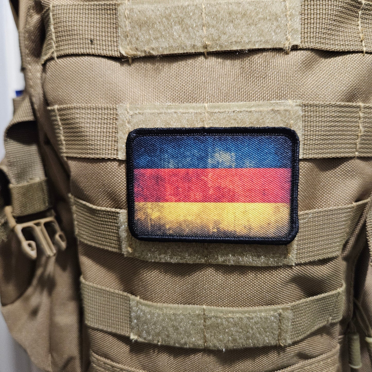 Distressed German flag 2"x3" morale patch with hook and loop backing