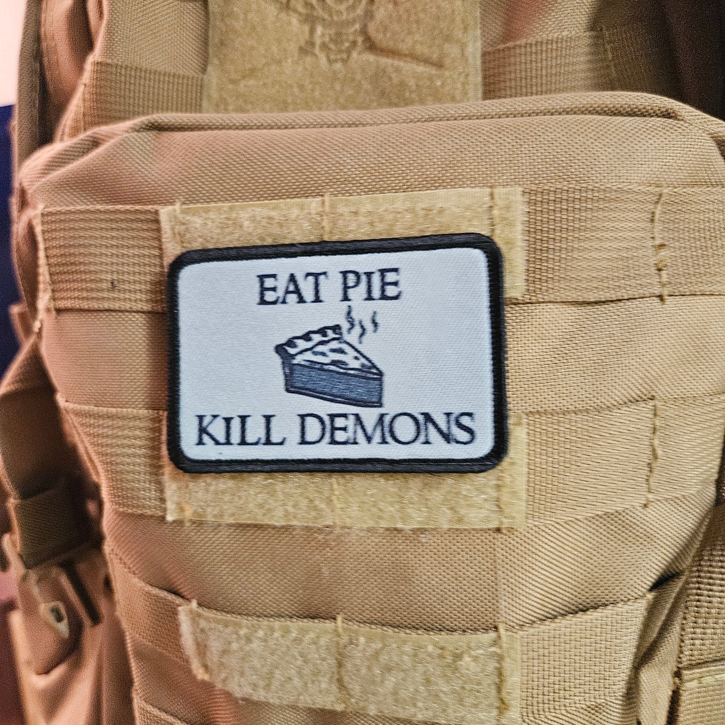 Eat pie kill demons funny meme  2"x3" removable morale patch with hook and loop backing