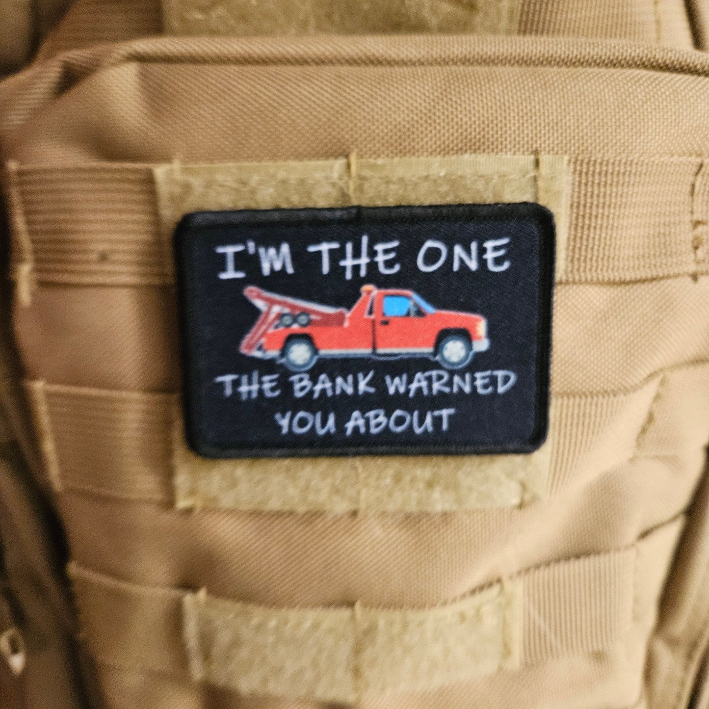I'm the one the bank warned you about tow truck repo funny 2"x3" removable morale patch with hook and loop backing