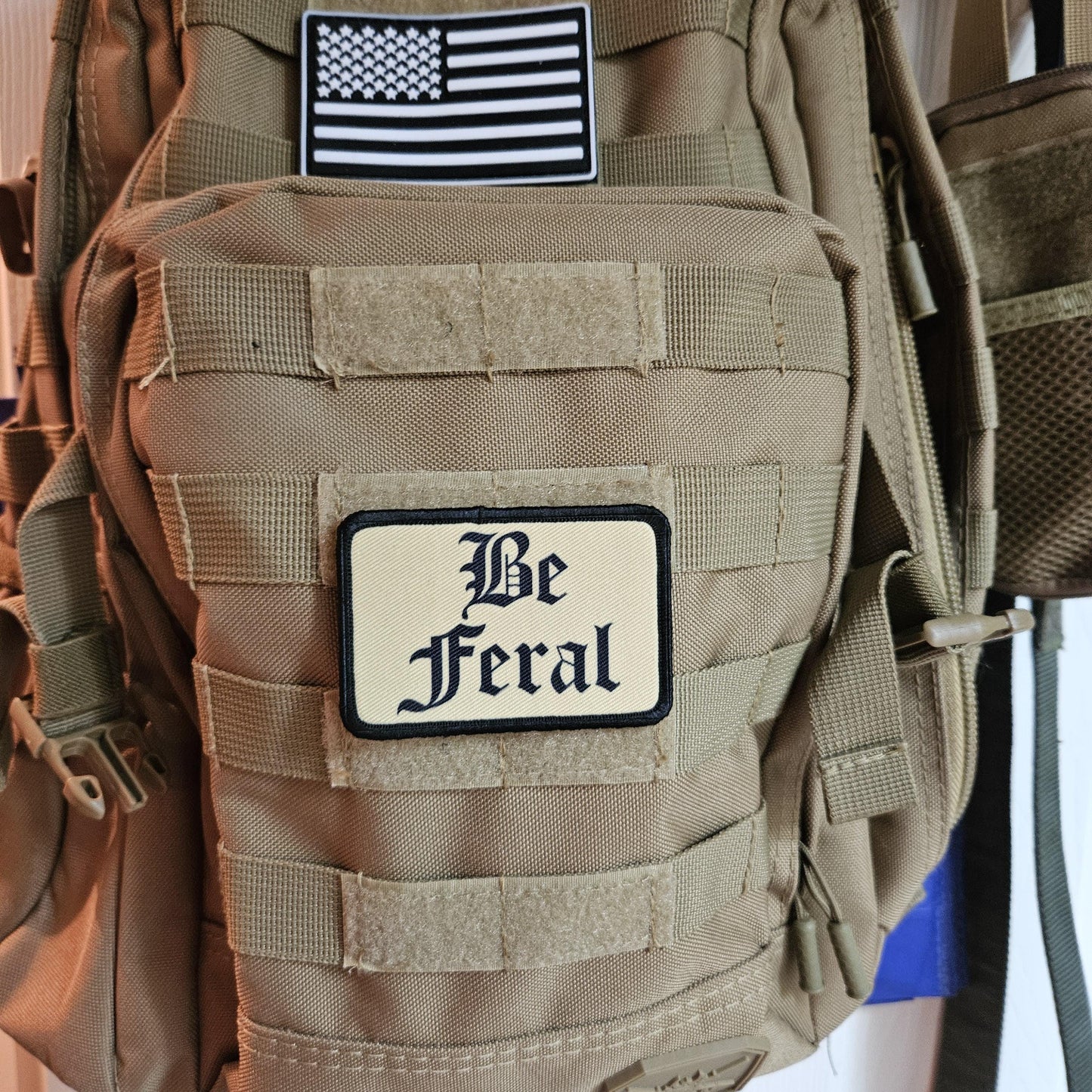 Tan "be feral" girls and boys meme 2"x3" morale patch with hook and loop backing