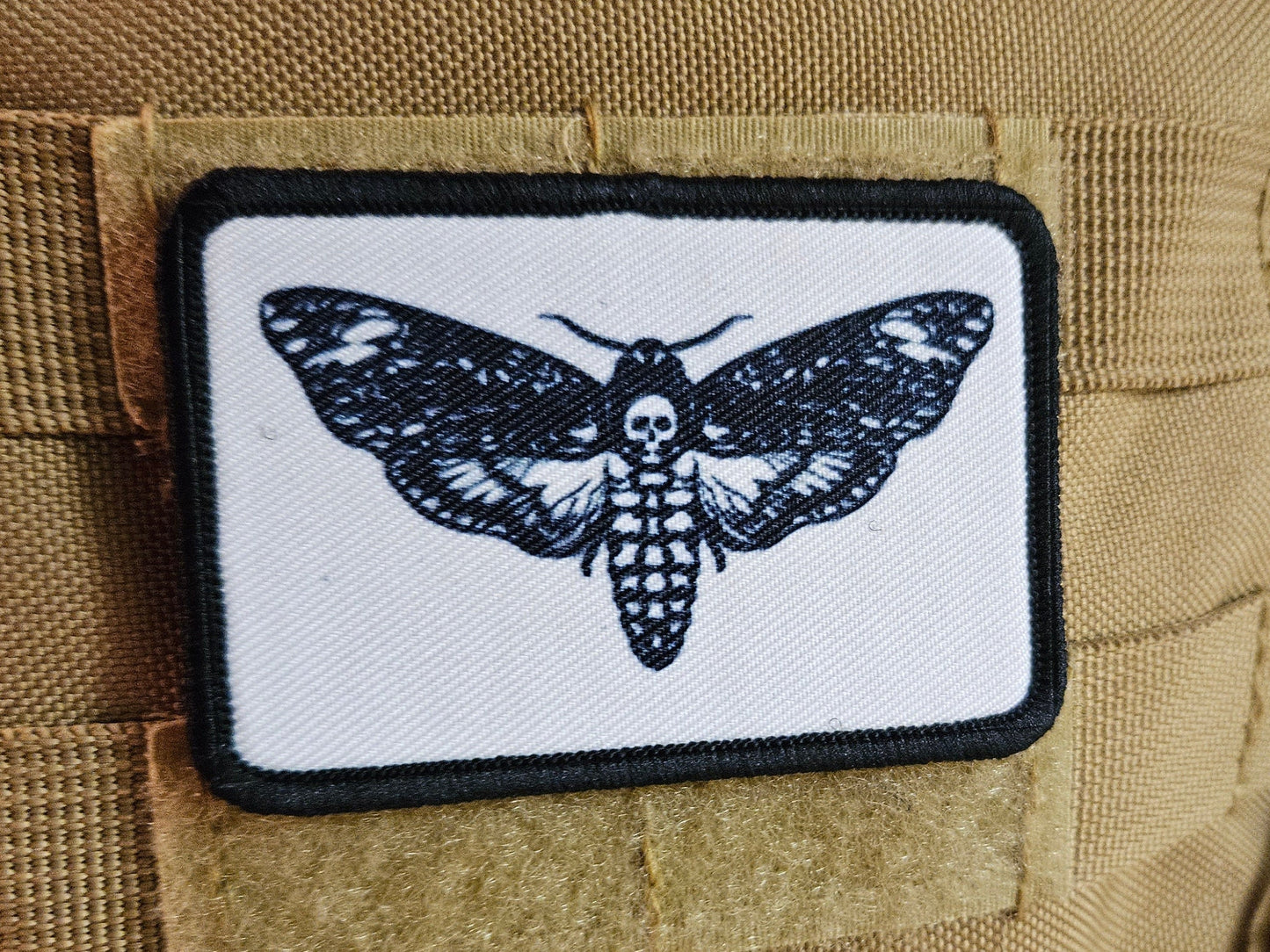 Desths head moth white background funny  2"x3" morale patch with hook and loop backing