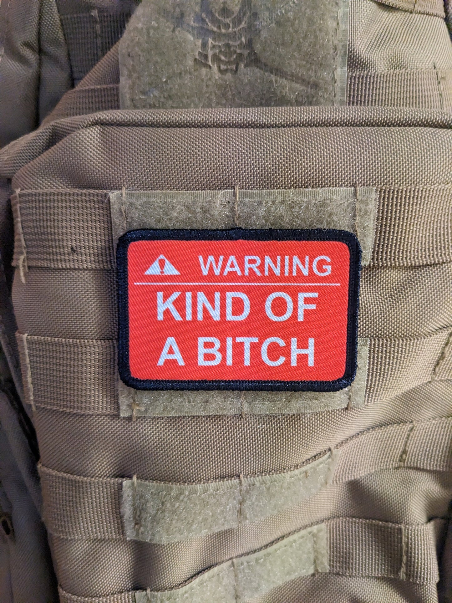 Warning kind of a bitch patch 2"x3" removable morale patch with hook and loop backing