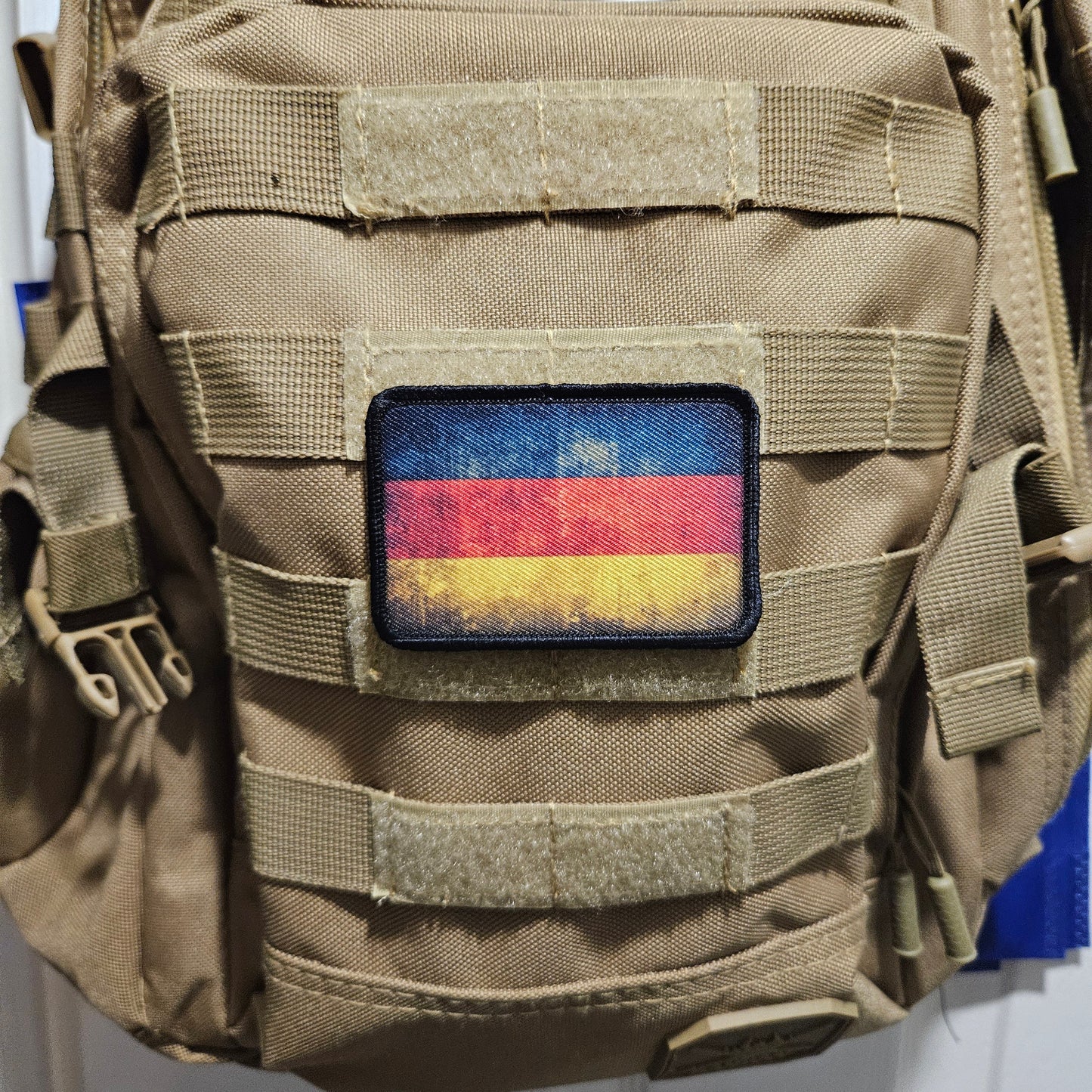 Distressed German flag 2"x3" morale patch with hook and loop backing