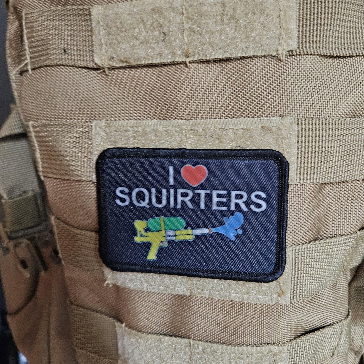 I love squirters meme 2"x3" morale patch with hook and loop backing