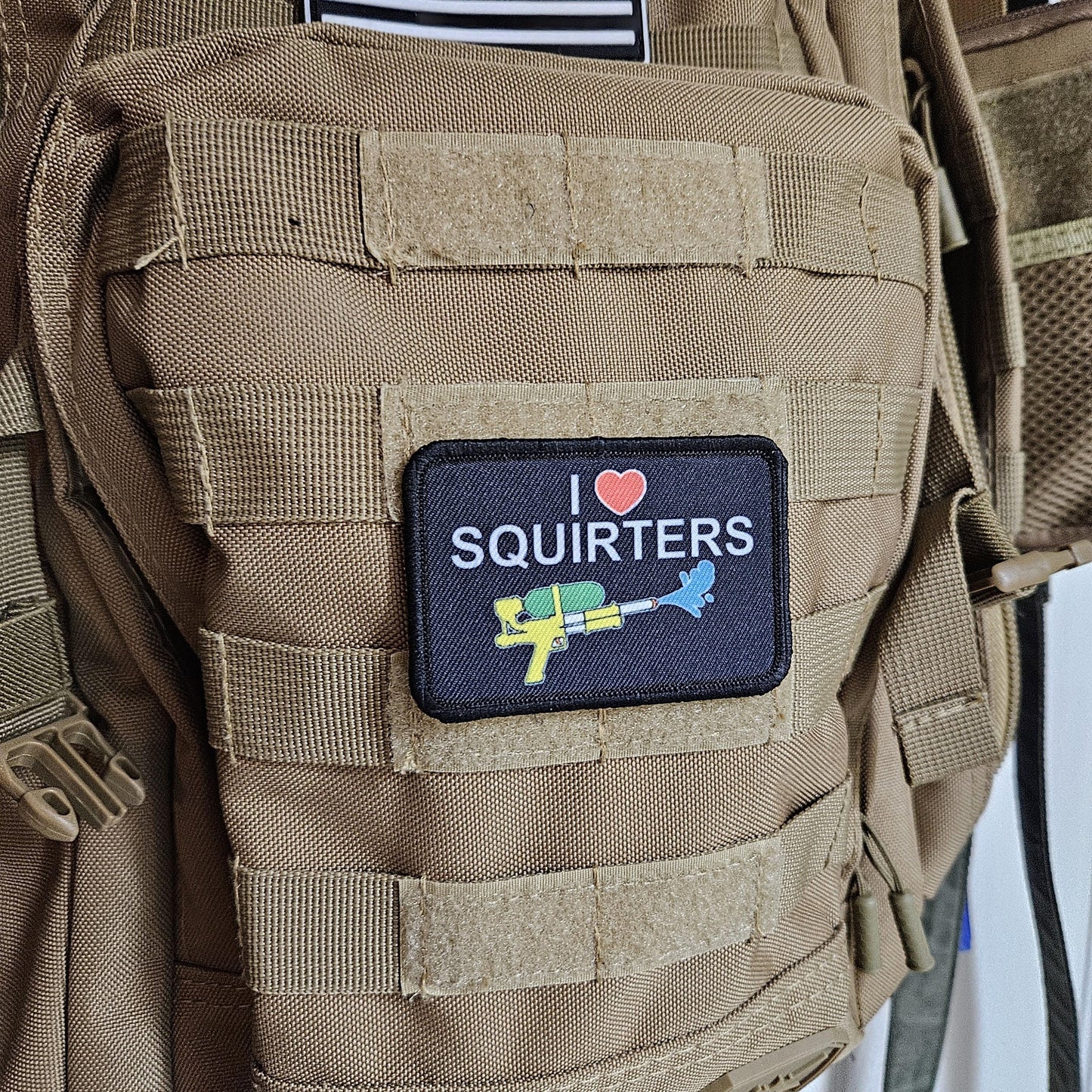 I love squirters meme 2"x3" morale patch with hook and loop backing