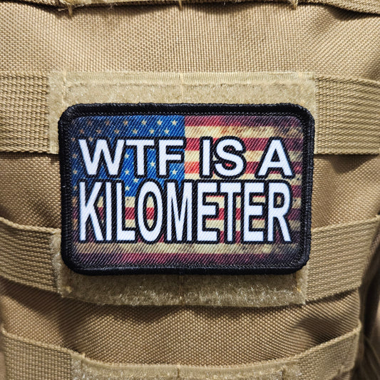 Wtf is a kilometer American flag 2"x3" morale patch with hook and loop backing