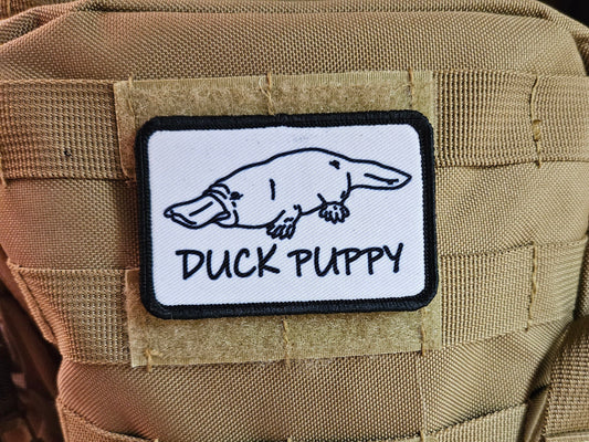 Duck puppy duck billed platypus white meme funny  2"x3" morale patch with hook and loop backing