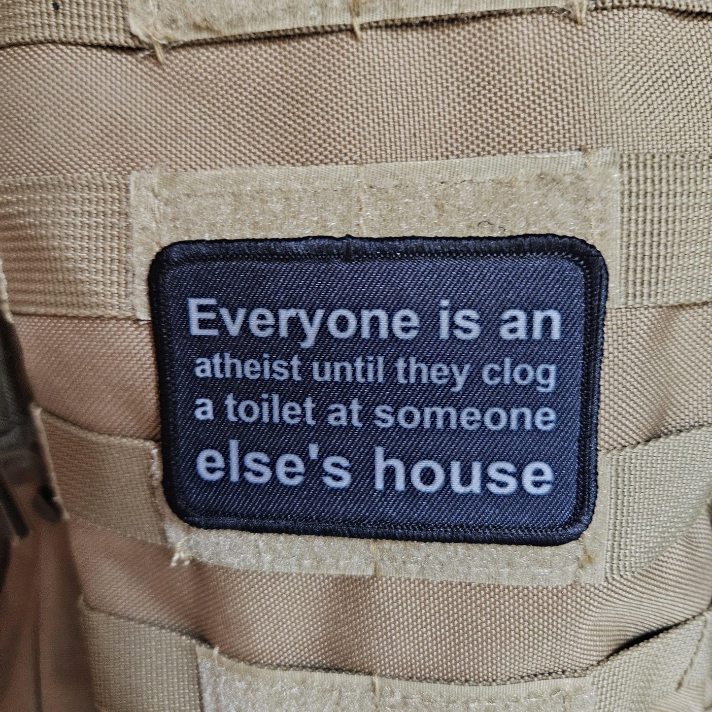 Everyone's an aetheist until they clog a toilet at somebody else's house 2"x3" removable morale patch with hook and loop backing