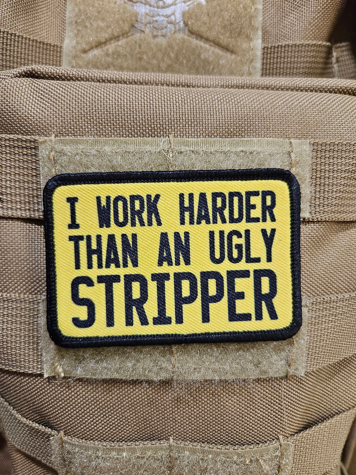 I work harder than an ugly stripper 2"x3"  removable morale patch with hook and loop backing