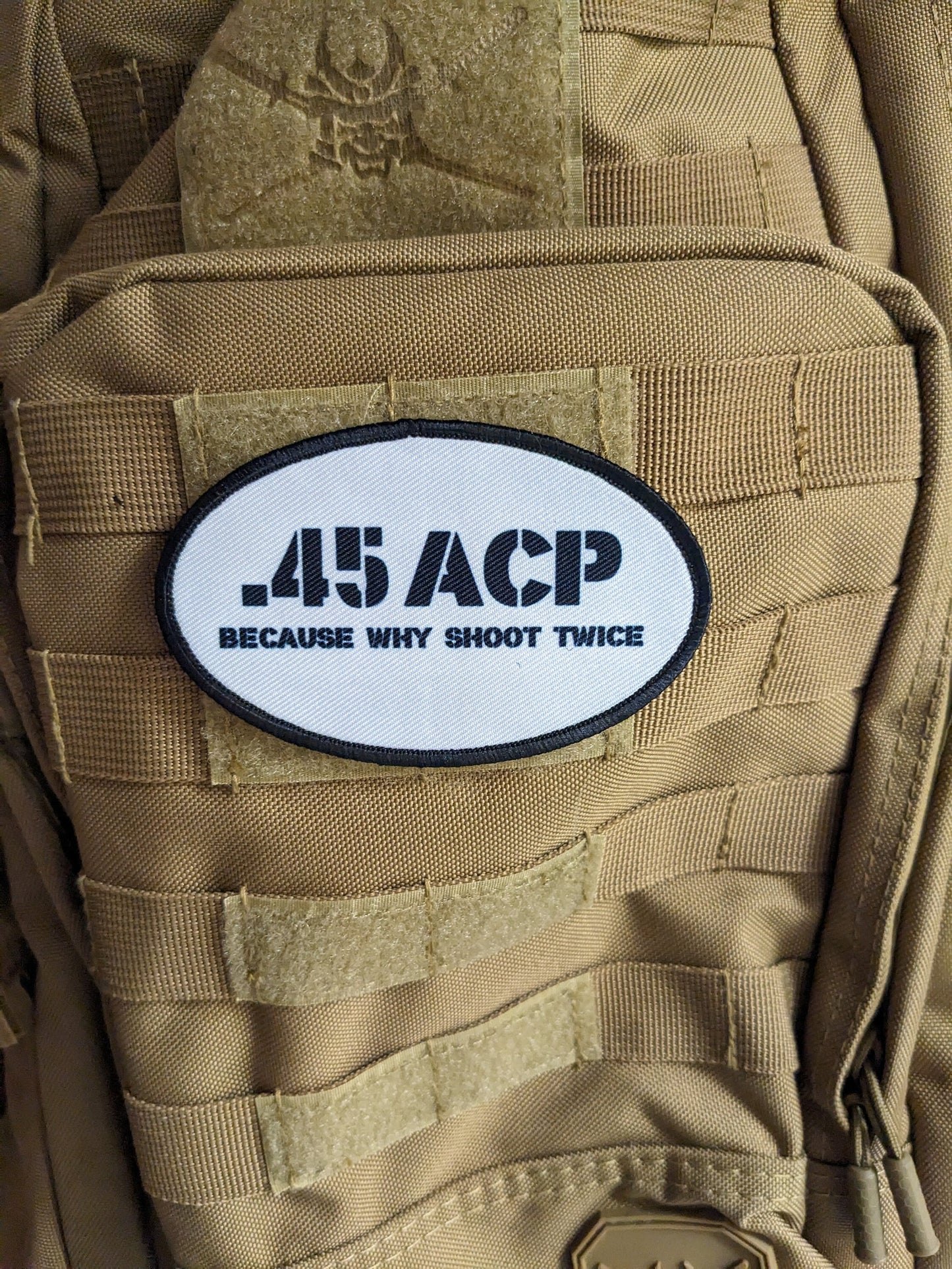 45 acp because why shoot twice running celebration joke  4"x2.5" oval morale patch with hook and loop backing