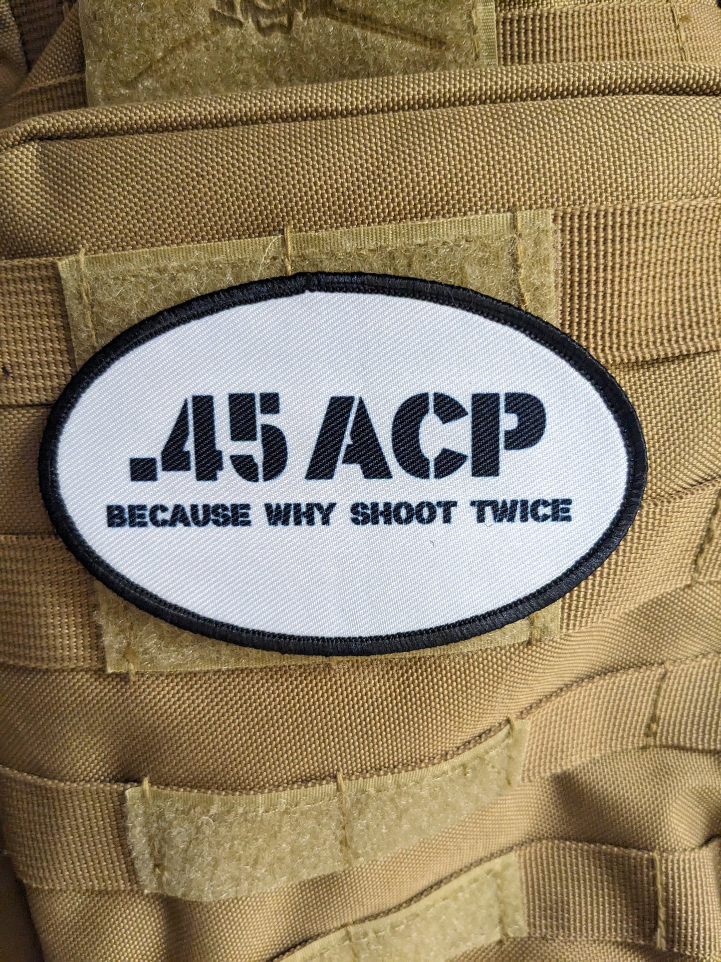 45 acp because why shoot twice running celebration joke  4"x2.5" oval morale patch with hook and loop backing