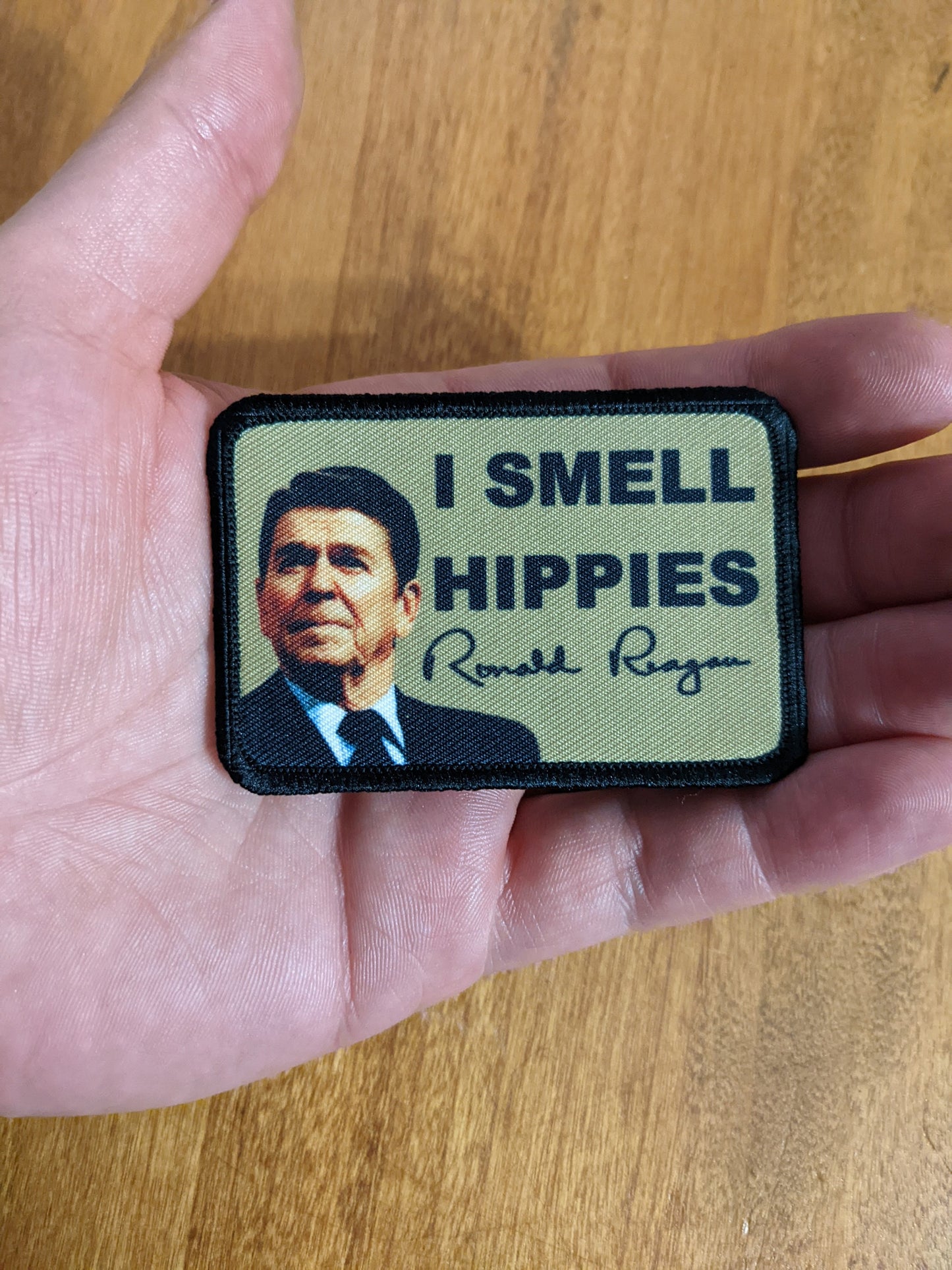 I smell hippies Ronald Reagan joke 2"x3" morale patch with hook and loop backing