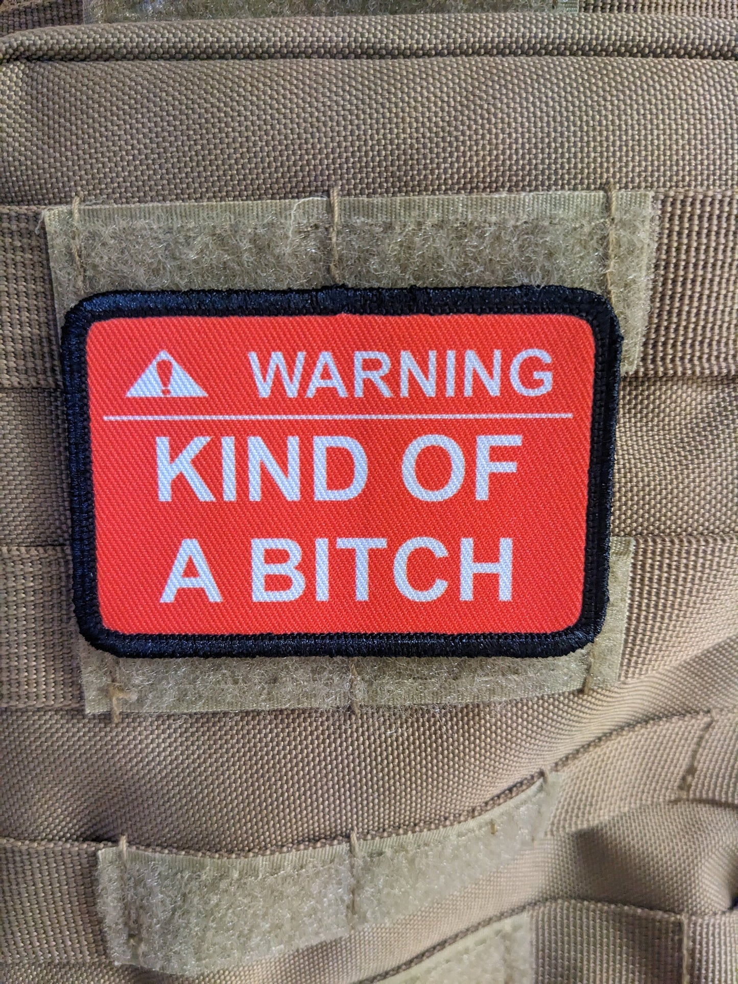 Warning kind of a bitch patch 2"x3" removable morale patch with hook and loop backing