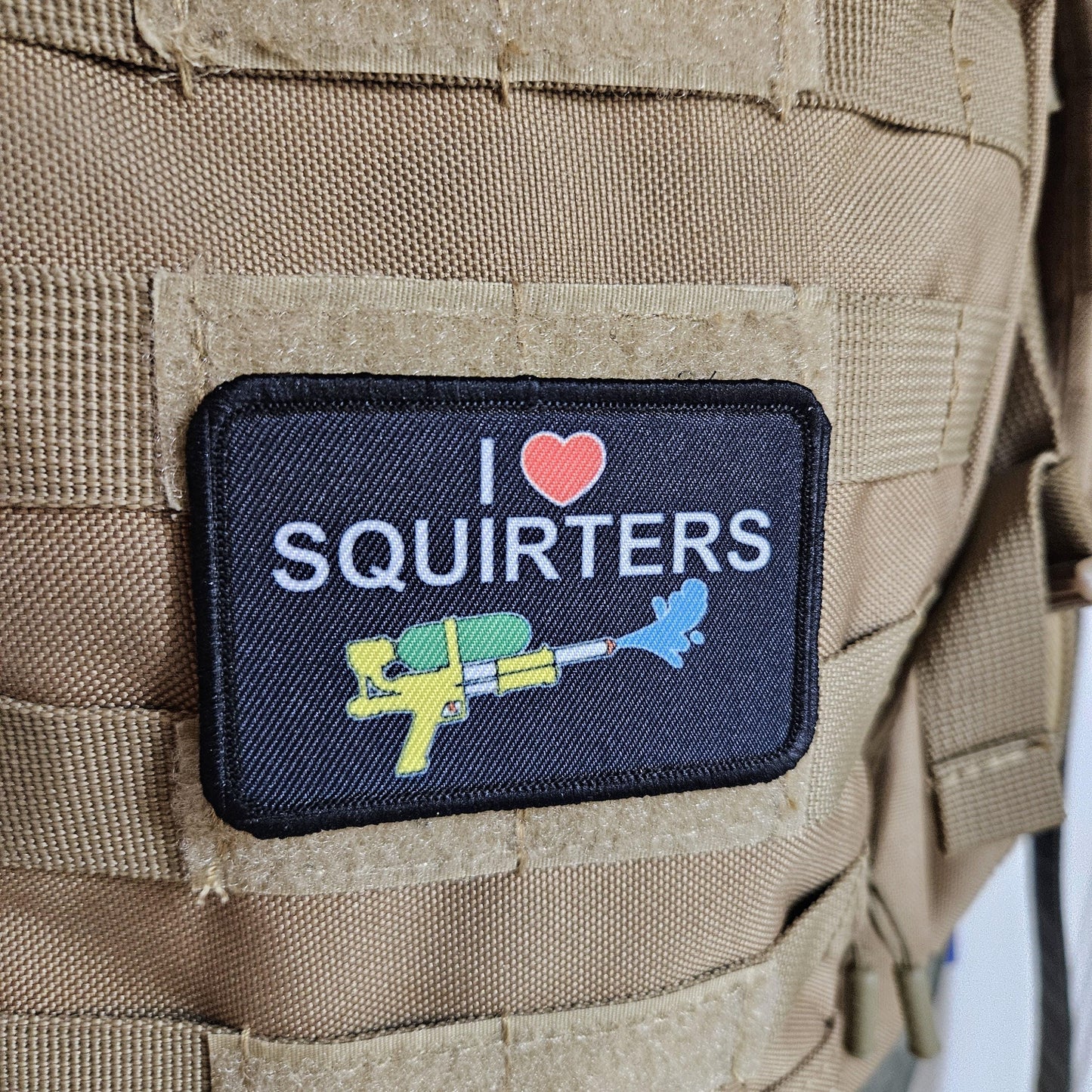 I love squirters meme 2"x3" morale patch with hook and loop backing