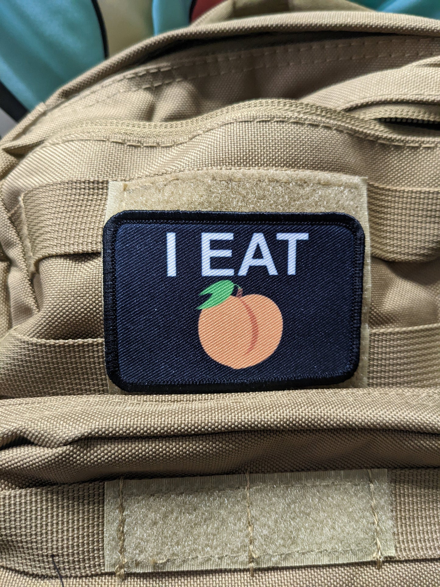 I eat peaches meme funny food black background  2"x3" removable morale patch with hook and loop backing