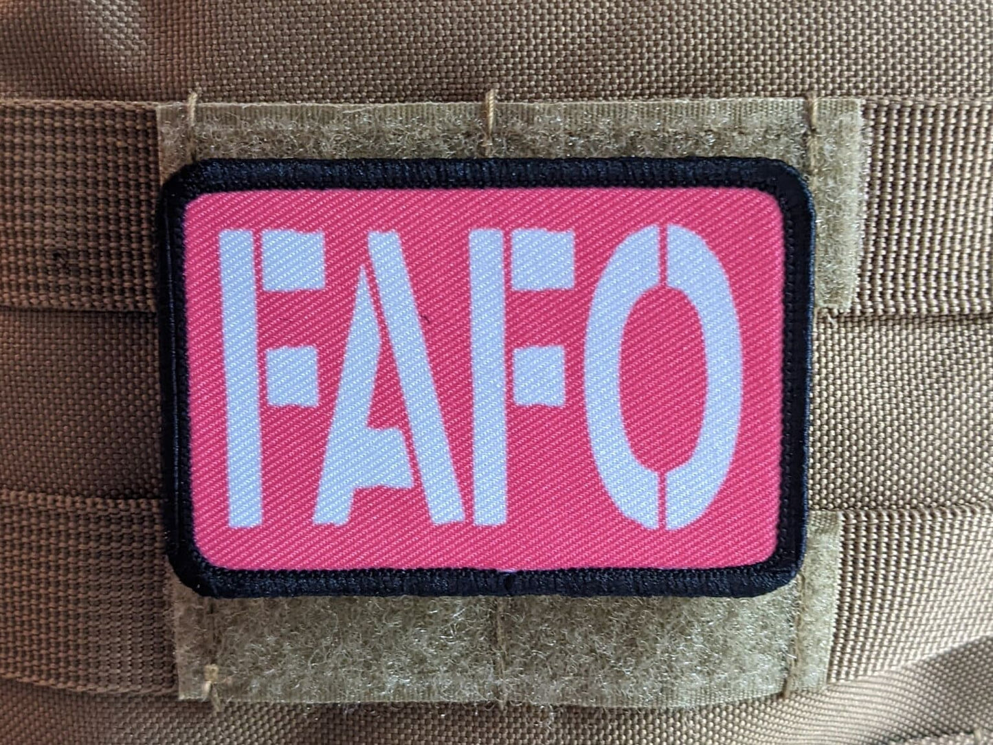 Fuck around and find out pink funny 2"x3" morale patch with hook and loop backing green background