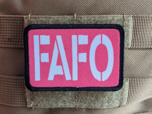 Fuck around and find out pink funny 2"x3" morale patch with hook and loop backing green background
