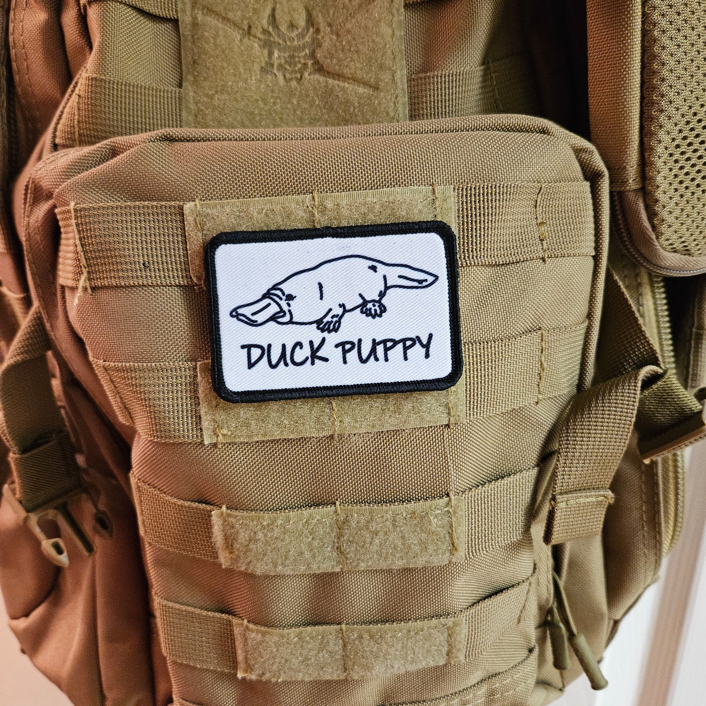 Duck puppy duck billed platypus white meme funny  2"x3" morale patch with hook and loop backing