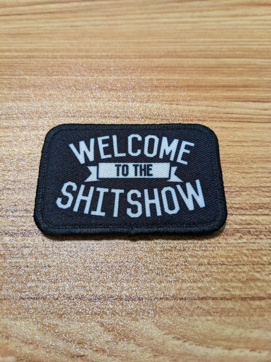 WELCOME to the SHITSHOW funny 2"x3" morale patch with hook and loop backing green background