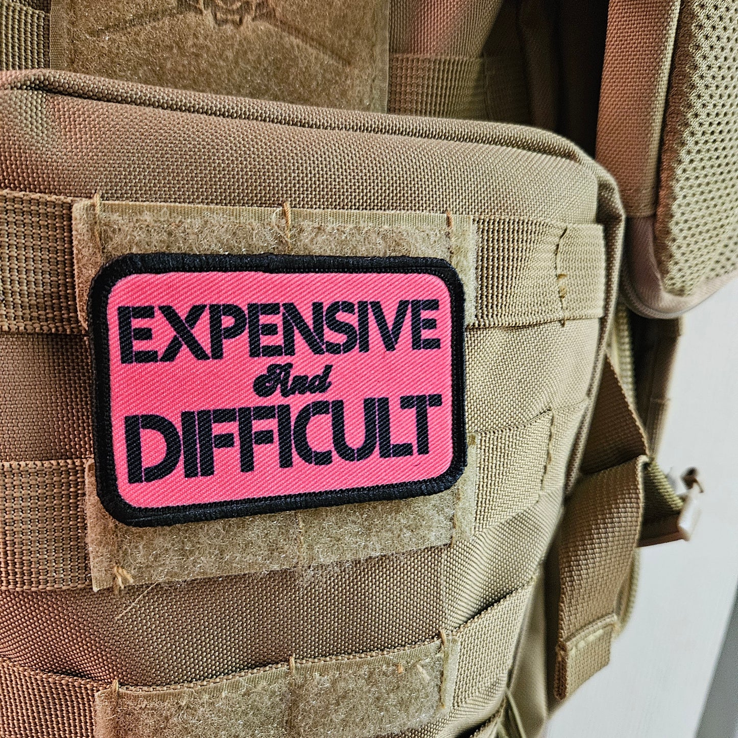 Expensive  and difficult meme pink 2"x3" removable morale patch with hook and loop backing
