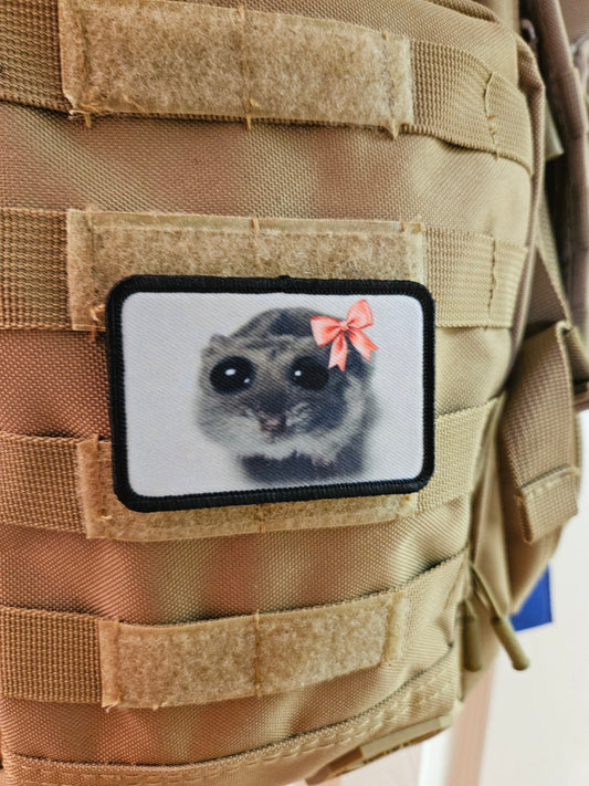 Sad hamster coquette meme 2"x3" removable morale patch with hook and loop backing