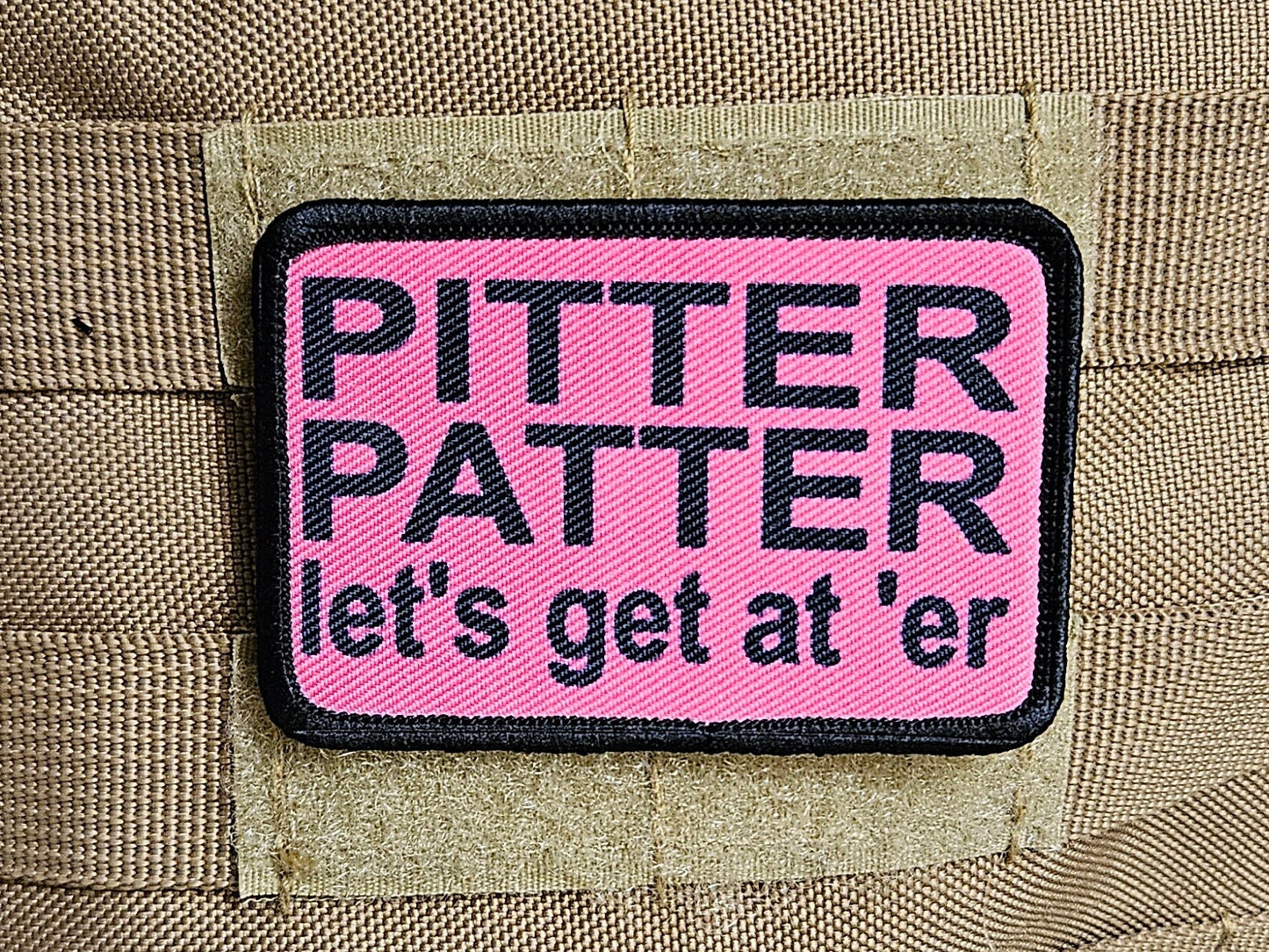 pink and black Pitter patter let's get at 'er meme 2"x3" removable morale patch with hook and loop backing